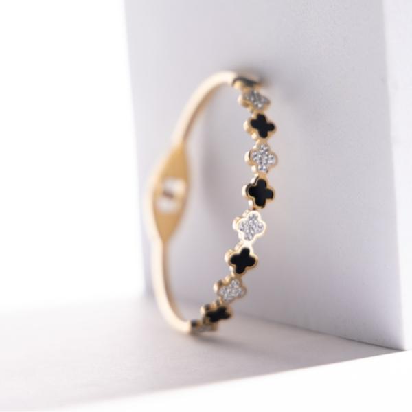 IRAMAT Elegant Gold & Black Clover Bracelet - Stylish Fashion Accessory for Everyday Glamour | Ideal for Gifting & Special Occasions