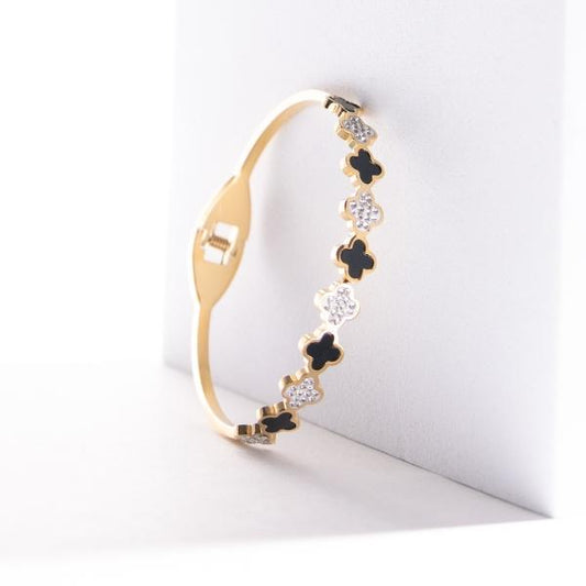 IRAMAT Elegant Gold & Black Clover Bracelet - Stylish Fashion Accessory for Everyday Glamour | Ideal for Gifting & Special Occasions