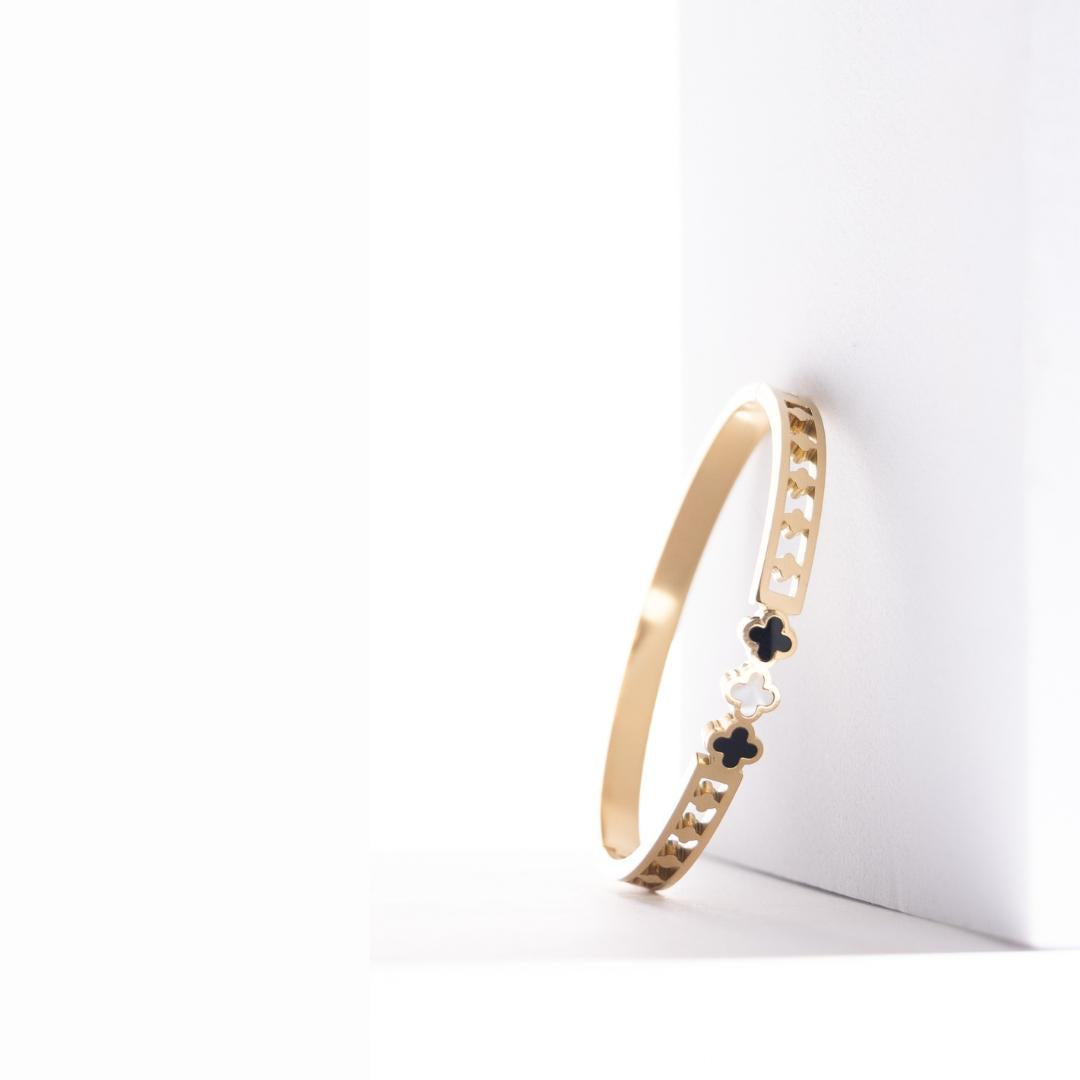 IRAMAT Gold-Plated Charm Bracelet – Black & White Accents, Everyday Elegance