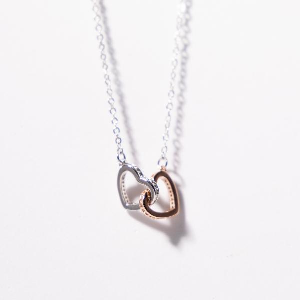 IRAMAT Double Heart Pendant Necklace - Symbol of Love & Connection | Stainless Steel Dual-Tone Jewelry for Women